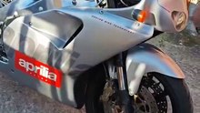 Aprilia rs 125 2t escape doble salida