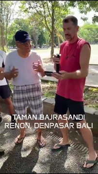 Australian Tourist Jump Like Van Halen with Balinese in Taman Bajrasandi, Bali