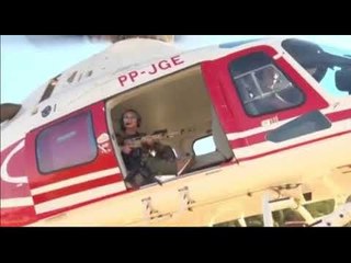 "Te cuida, Lázaro". Deputada bolsonarista aparece de fuzil em helicóptero e critica Caiado