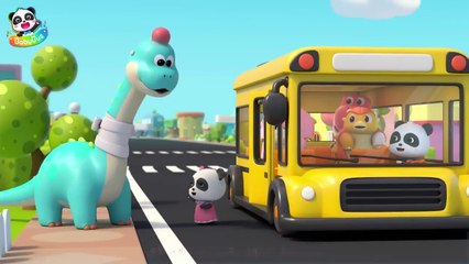 The Wheels on the Bus (Dinosaur Version) _ Dino Bus Song _ Nursery Rhymes & Kids Songs _ BabyBus