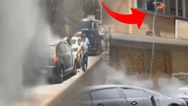 Yanan otomobili evinin penceresinden söndürmeye çalıştı