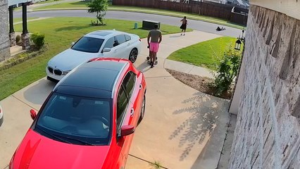 Man and Woman Fall While Skating Down Steep Driveway