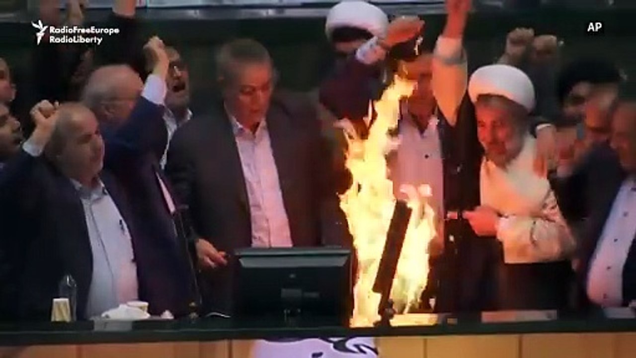 Iranian Parliament, MPs burn the American flag while chanting “Death to America