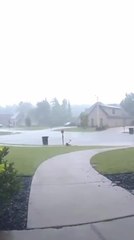 Boy Slips Running in Rain