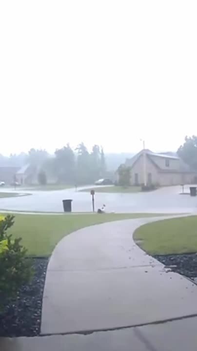 Boy Slips Running in Rain