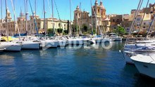 Beautiful marina harbour in Malta filled with boats nice buildings in background