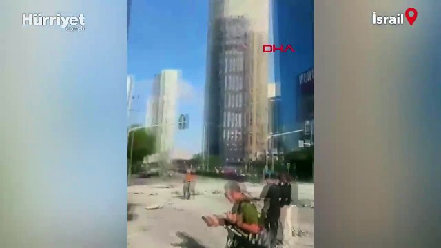 İran'dan İsrail'e balistik füze saldırısı! İsrail borsası vuruldu çok sayıda bina isabet aldı