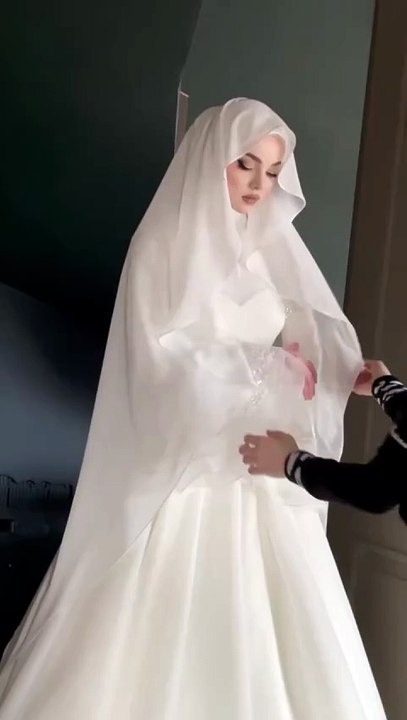 Elegance wrapped in faith — a hijabi bride shining with beauty, grace, and timeless tradition.