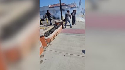 Protesters confront ICE personnel in California