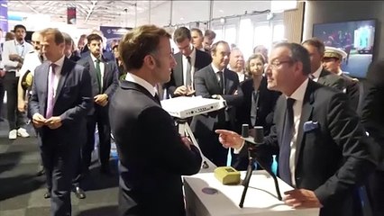 Macron urges Europe to ramp up space investment as Eutelsat climbs