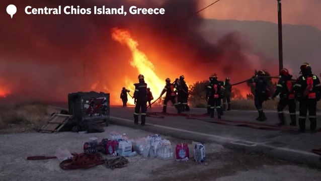 Wildfires ravage Greek holiday island as fire crews battle blazes and dozens evacuated