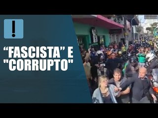 Seguranças de Bolsonaro retiram mulher de motociata em Juiz de Fora