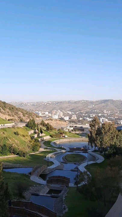 The greenery and sky of Prince Hossam Park in Al-Bahah, Saudi Arabia are stunning to see.