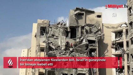 İran'dan ateşlenen füzelerden biri, İsrail'in güneyindebir binaya isabet etti