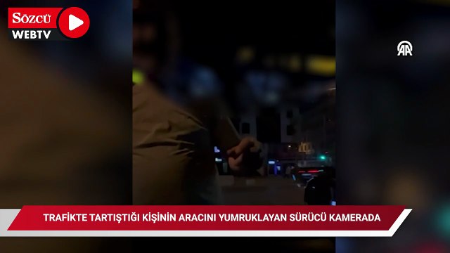 Trafikte tartıştığı kişinin aracını yumruklayan sürücü kamerada