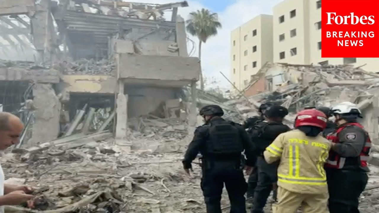 Residents Of Haifa, Israel, Survey Damage As Iranian Airstrikes Continue