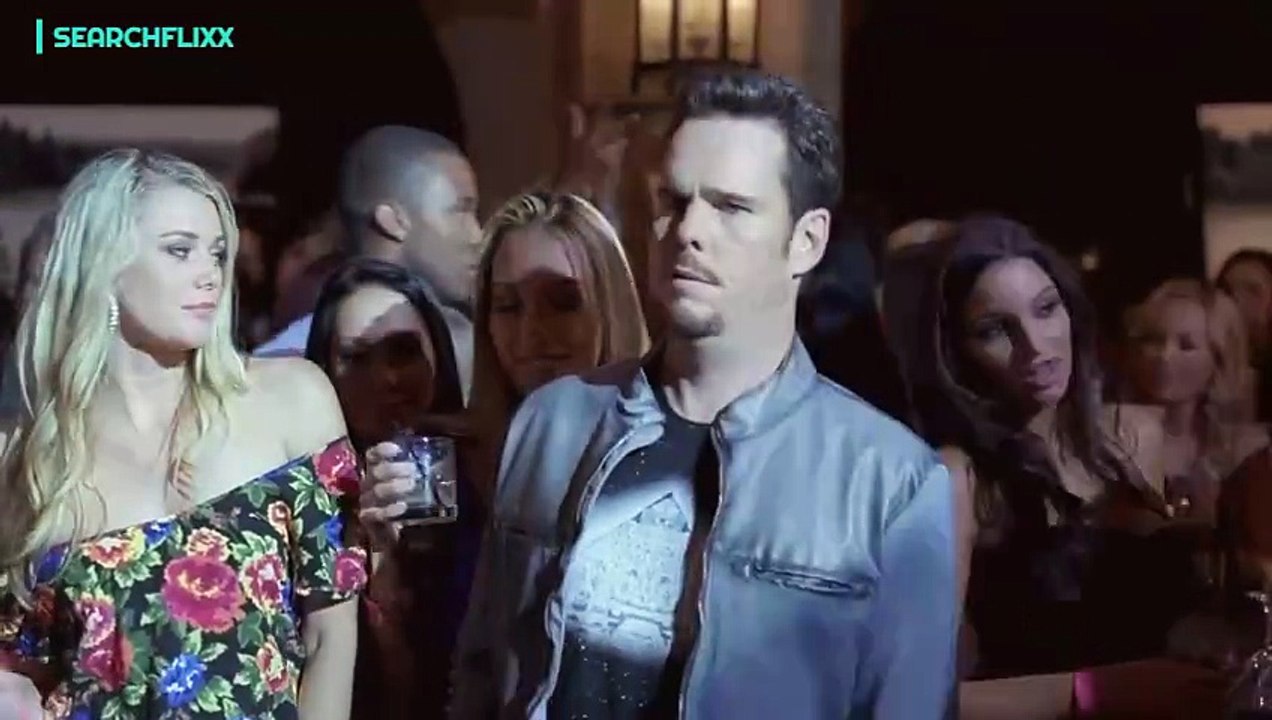 Eminem punches Vincent Chase.