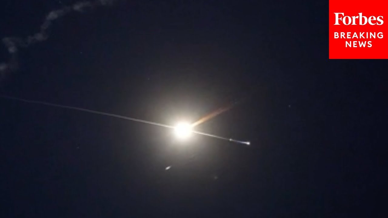 Missiles Launched By Iran Against Israel Are Seen In The Sky Over East Jerusalem