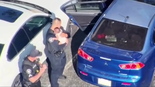 Watch: Police smash window to rescue baby locked in 110-degree car
