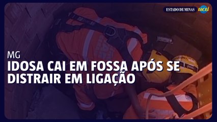 Idosa cai em fossa após se distrair em ligação