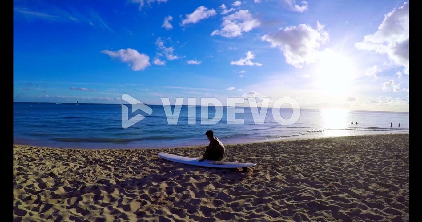 Surfer with surfboard surfing in sea water 4k