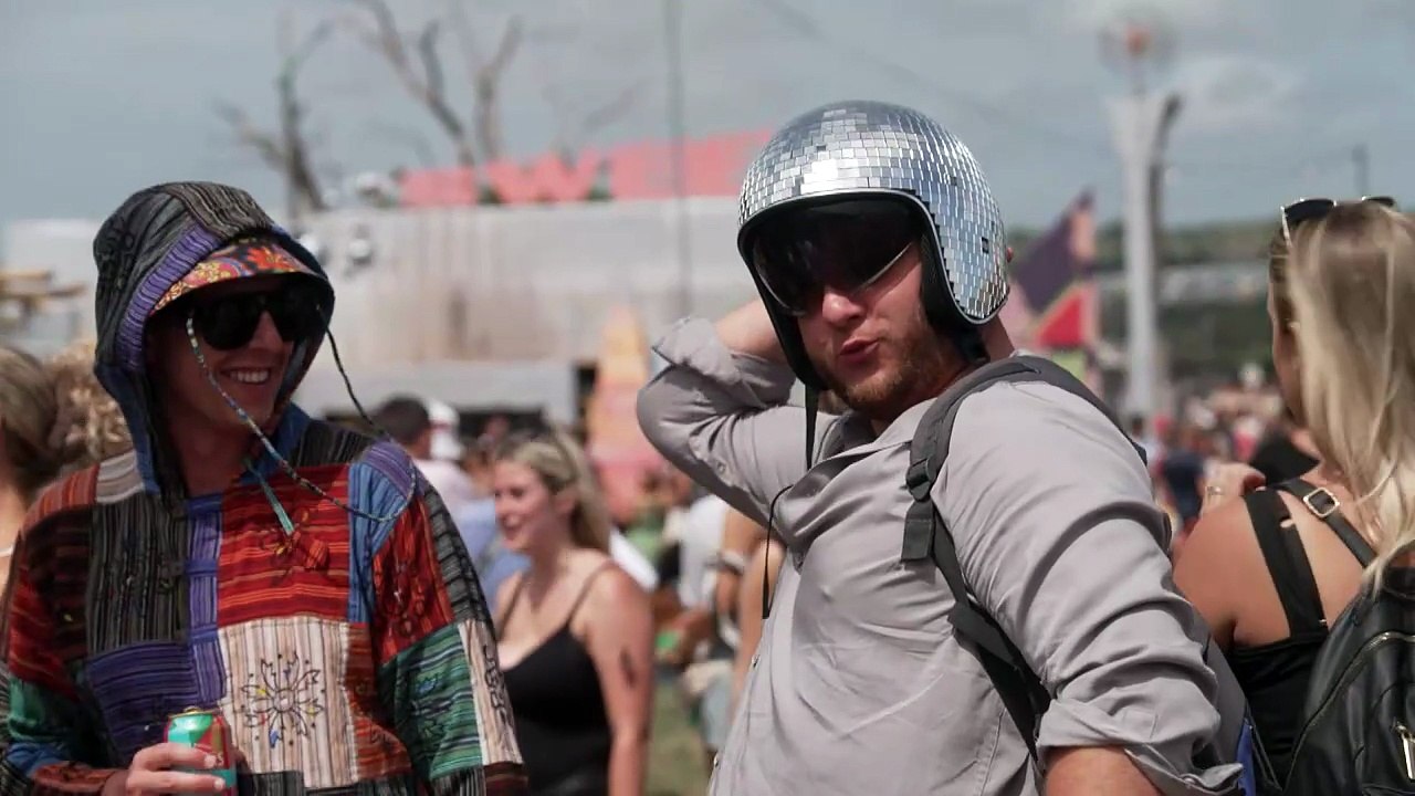 Revellers arrive at the Glastonbury Festival in Somerset