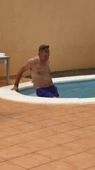 Man Slips and Falls While Getting into Pool
