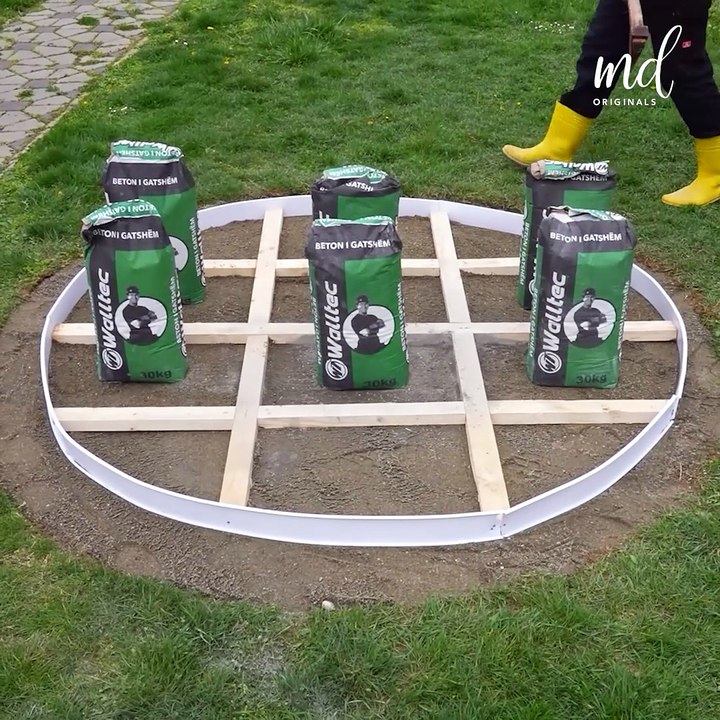 Creating a circular concrete patio through dry pour method