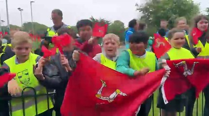 Sir Mark Cavendish Raceway Opening - Kids waving flags