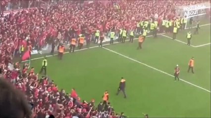 The moment Bayer Leverkusen fans stormed the pitch after winning their first ever Bundeslig