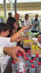 Children distribute free ice cream, juice, water to Dubai workers