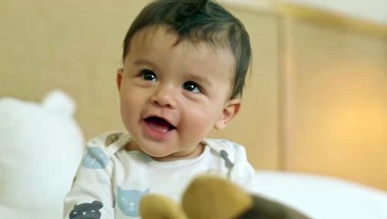 mixkit-portrait-of-a-smiling-little-baby-49974-hd-ready