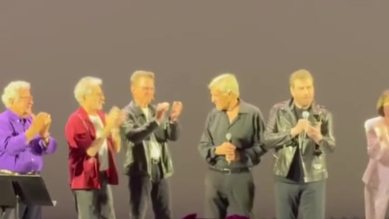 John Travolta shocks fan dressed as Danny Zuko in surprise Grease concert