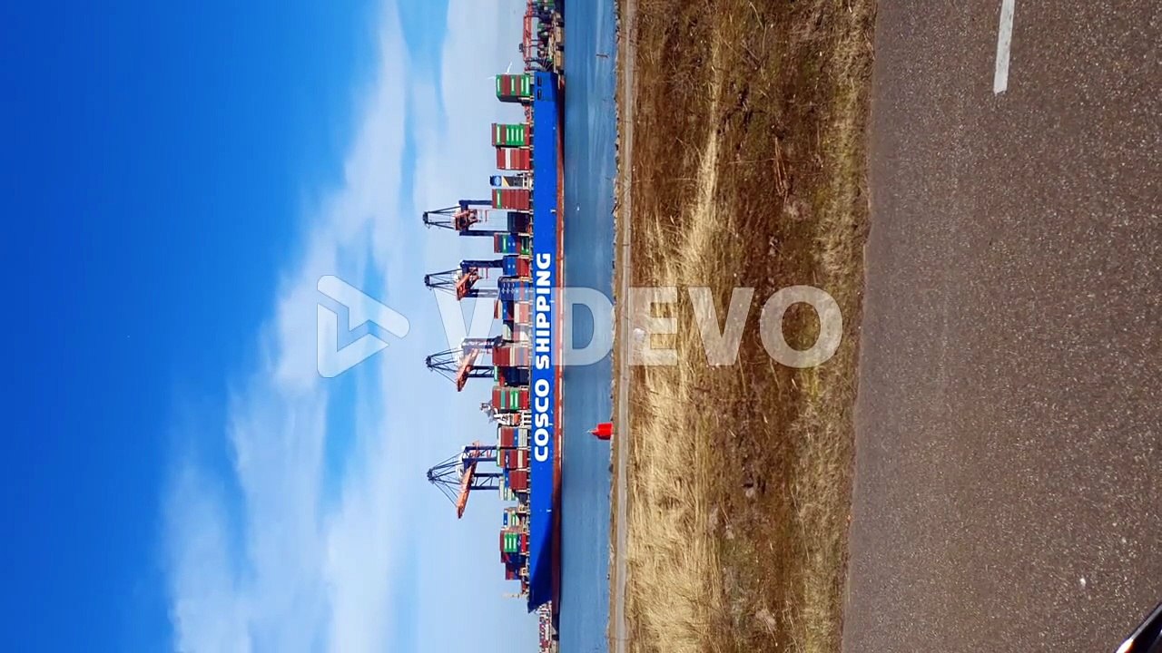 Cosco Shipping Vessel Moored At Euromax Terminal With Gantry Cranes Moving Cargo Containers