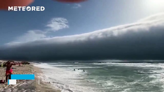A large roller cloud engulfs the beaches of Povoa do Varzim, Portugal! This impressive cloud formation surprised beachgoers