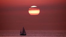 mixkit-view-of-the-horizon-in-the-sea-while-a-sailboat-4477-hd-ready