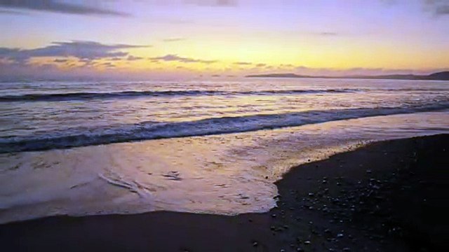 mixkit-sunset-from-a-peaceful-beach-44496-hd-ready