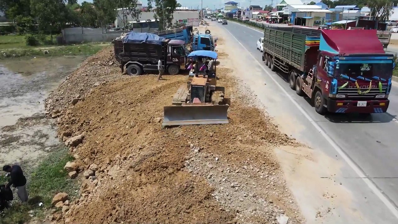 Best Amazing Activity Landfill using with Dozer Komatsu D31P Pushing Soil into water Refill Land