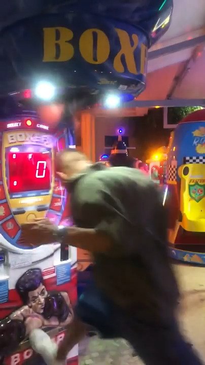 Man Headbutts Punching Machine After Hitting Bag