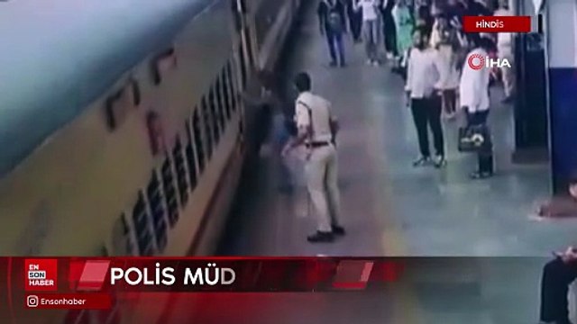 Hindistan'da hareket eden trene binmeye çalışan kadın ezilmekten kıl payı kurtuldu
