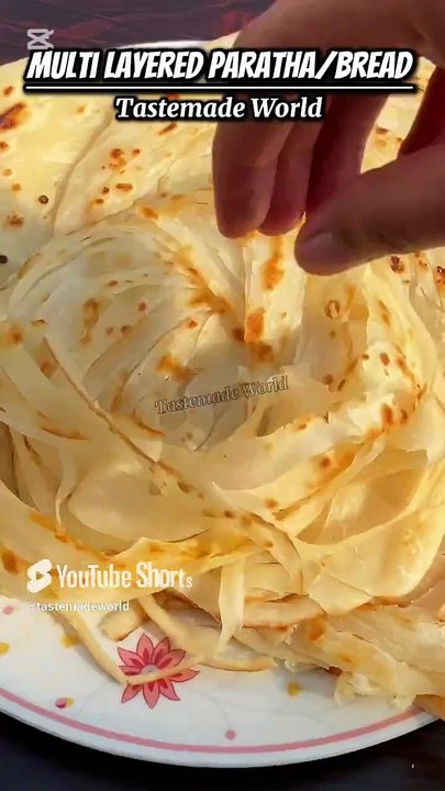 Easy Multi Layered Paratha_ Bread Recipe #Shorts #tastemadeworld #paratha #breakfast