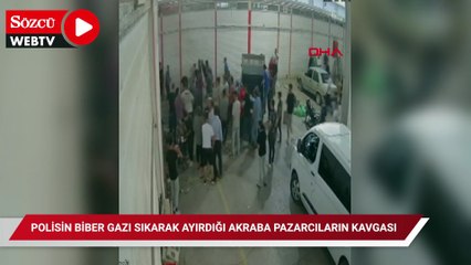 Polisin biber gazı sıkarak ayırdığı akraba pazarcıların kavgası kamerada