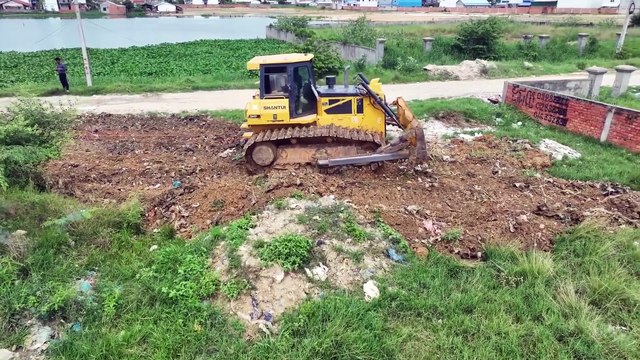 INCREDIBLE OPERATED OF FILLING FLOODED LAND NEXT TO THE ROADS USE SHANTUI DOZER AND SMALL 5T TRUCKS