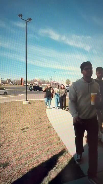 Woman Falls While Carrying Drinks