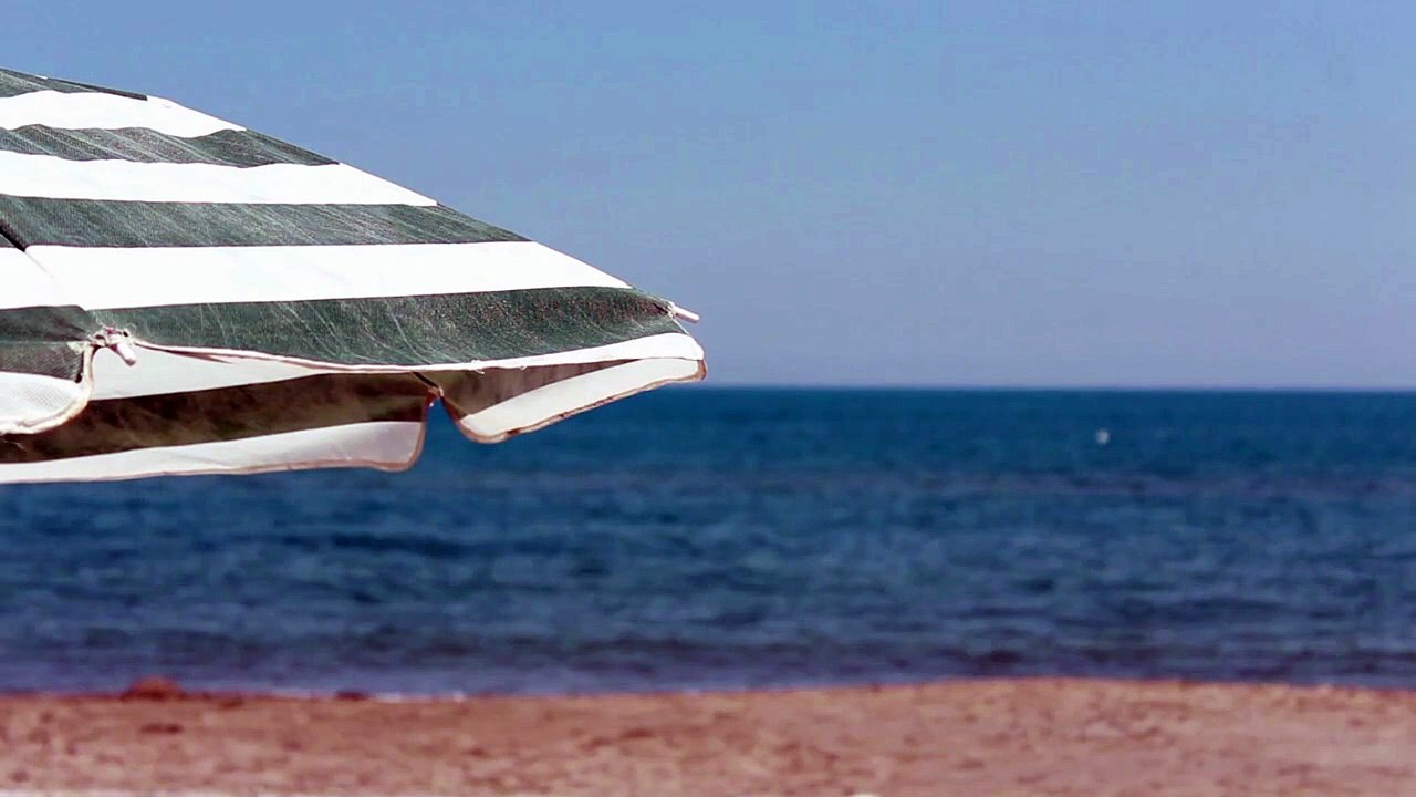 Sun Umbrellas On Beach