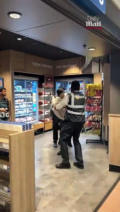 The tide turns against the shoplifter at Greggs on Hammersmith Broadway, London.