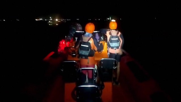 Rescue search underway after ferry sinks off coast of Bali with more than 60 people onboard