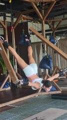 Woman Spins Mid-Air on Stretching Machine