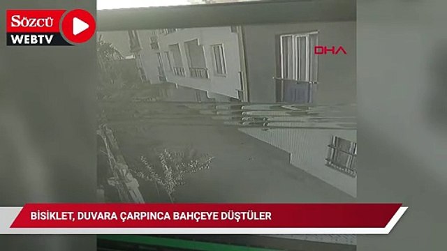 Bisiklet, duvara çarpınca bahçeye düştüler; kaza kamerada