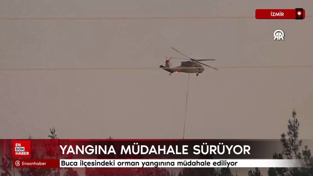 İzmir'in Buca ilçesindeki orman yangınına müdahale ediliyor